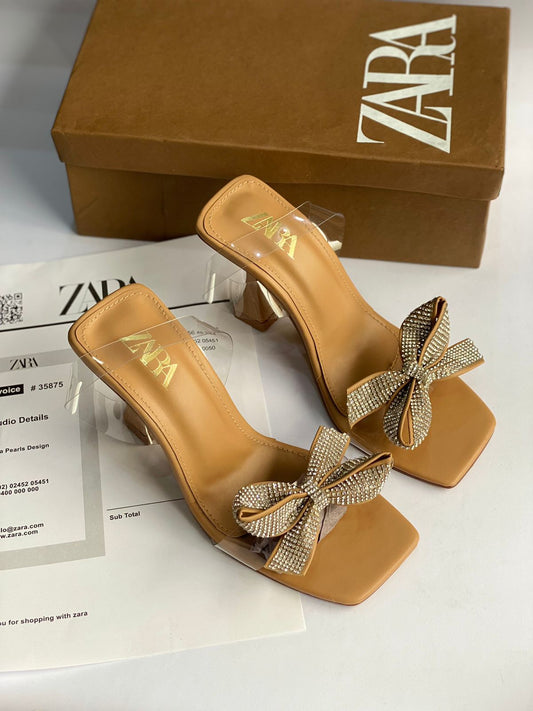 HEELED VINYL SANDALS WITH BOW