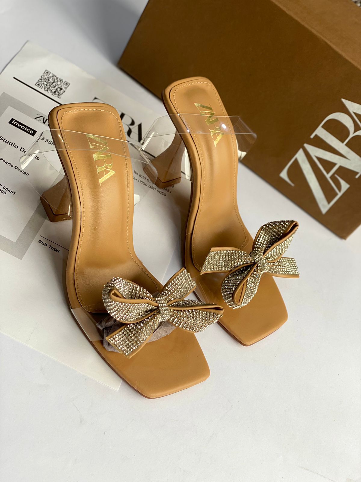 HEELED VINYL SANDALS WITH BOW