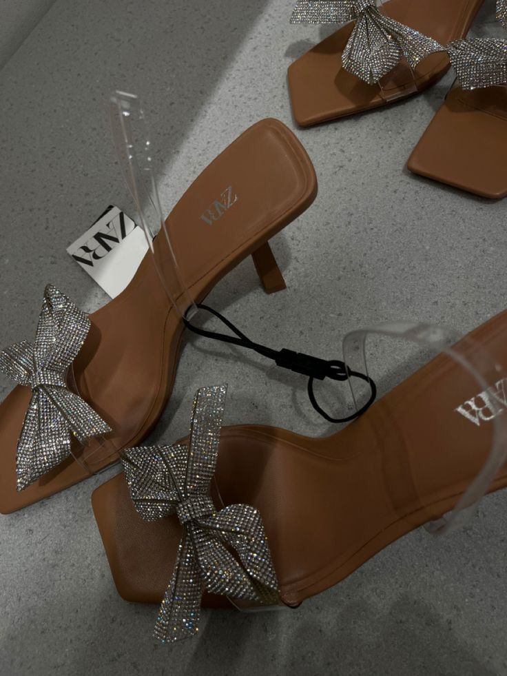 HEELED VINYL SANDALS WITH BOW